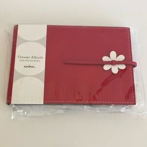 Red and White Leather Storage Album with Flower Closure